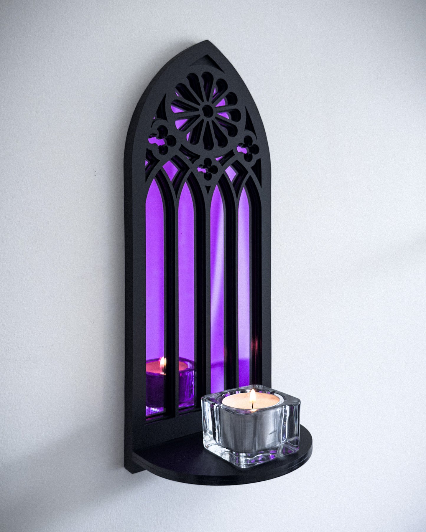 Rose window wall shelf in black layered acrylic with purple mirror backing and candle display