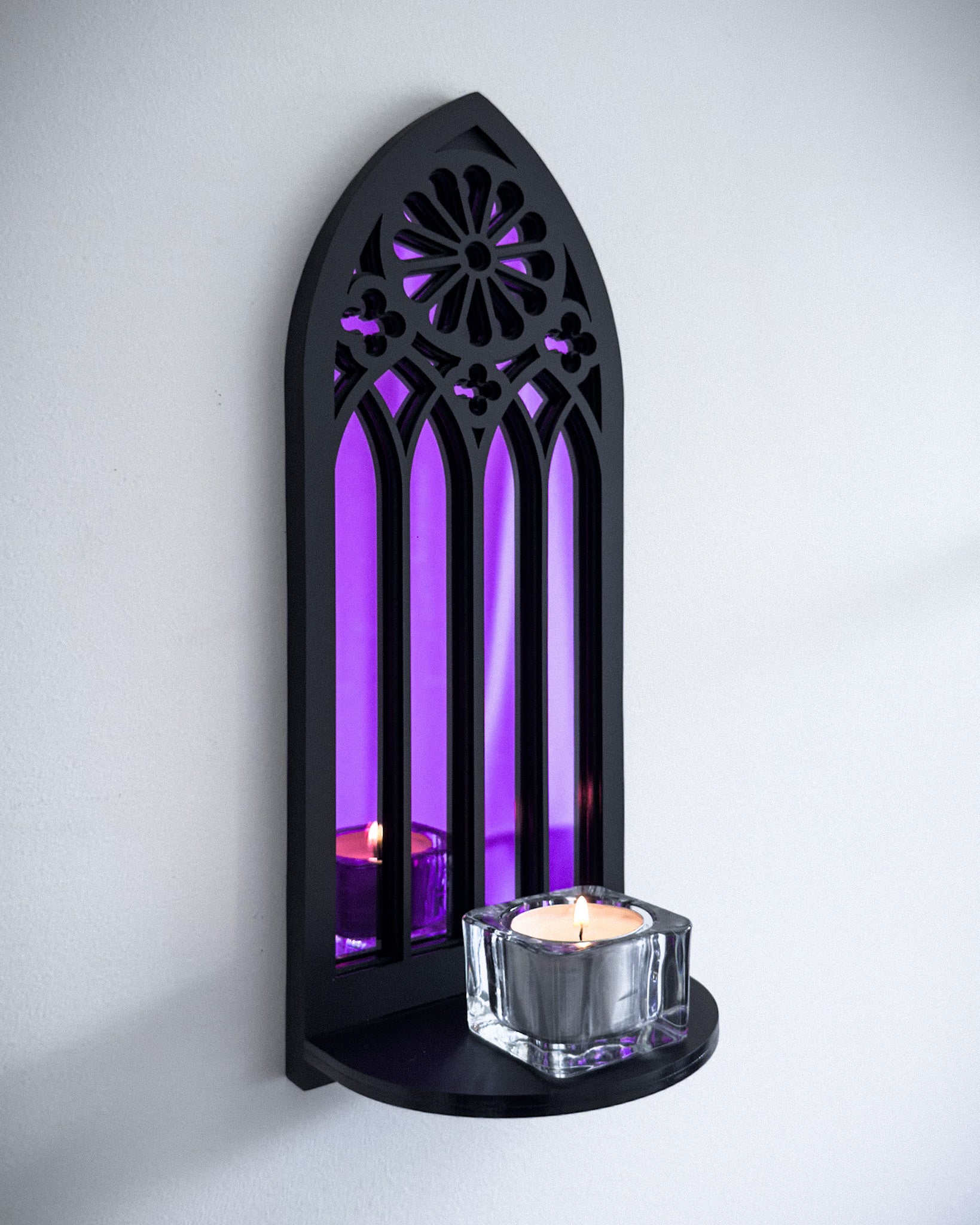 Rose window wall shelf in black layered acrylic with purple mirror backing and candle display