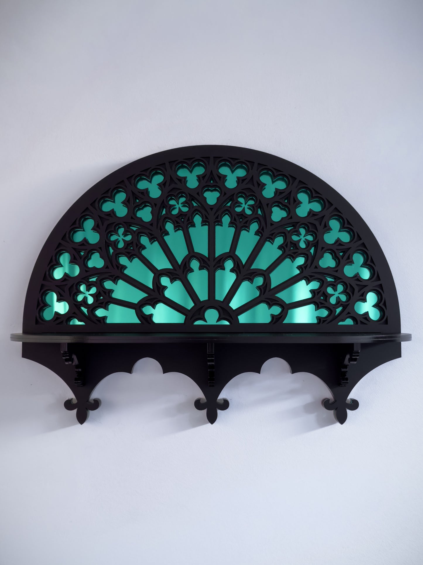 Notre Dame rose window gothic wall shelf with mirror centre on white wall