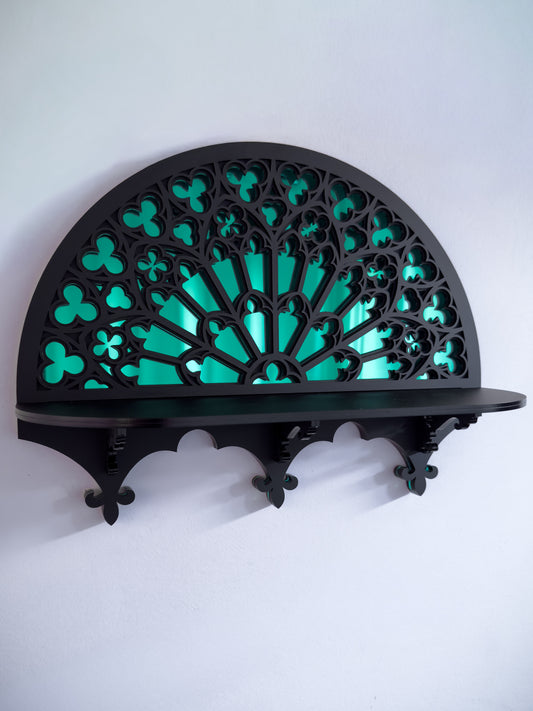 Notre Dame rose window shelf in black acrylic with mirror centre on white wall
