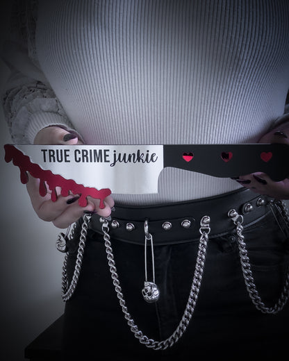 True crime junkie knife mirror wall art held for scale with blood drip detail