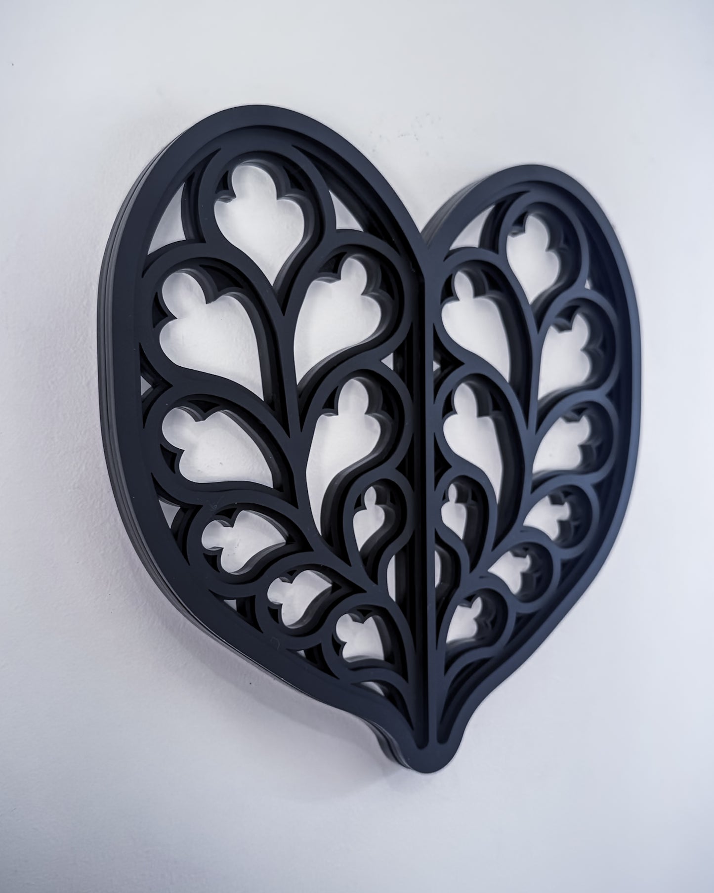 Side view of Heart of Yorkshire gothic cathedral tracery wall art on light grey wall