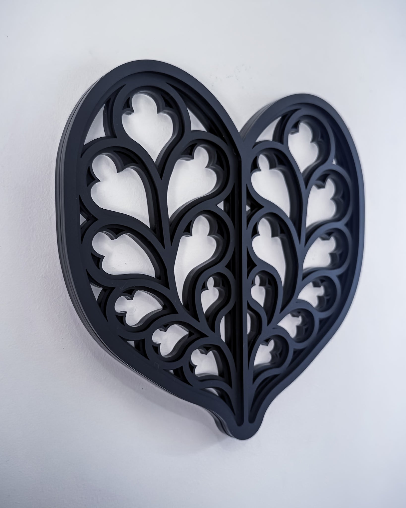 Side view of Heart of Yorkshire gothic cathedral tracery wall art on light grey wall