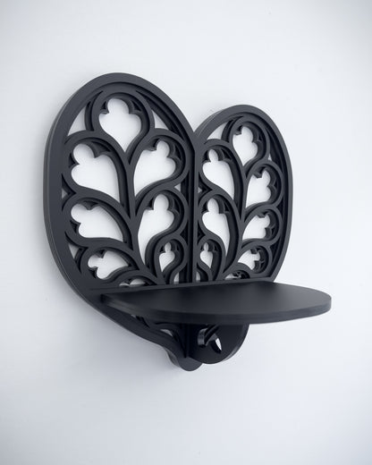 Close-up of Heart of Yorkshire cathedral tracery wall shelf in black layered acrylic
