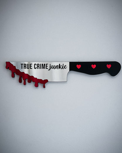 True crime junkie knife mirror wall art with blood drip detail mounted on wall
