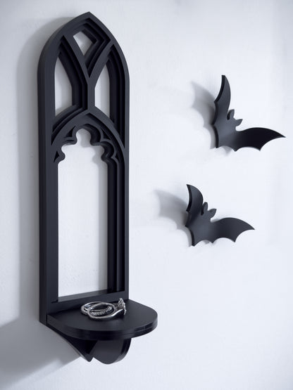 Salem tracery wall shelf in black layered acrylic on a white gallery wall with acrylic bats
