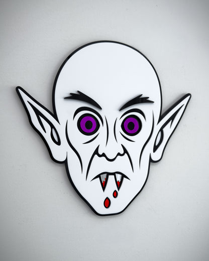 Nosferatu vampire face wall art in black and white acrylic with mirror purple eyes and blood detail