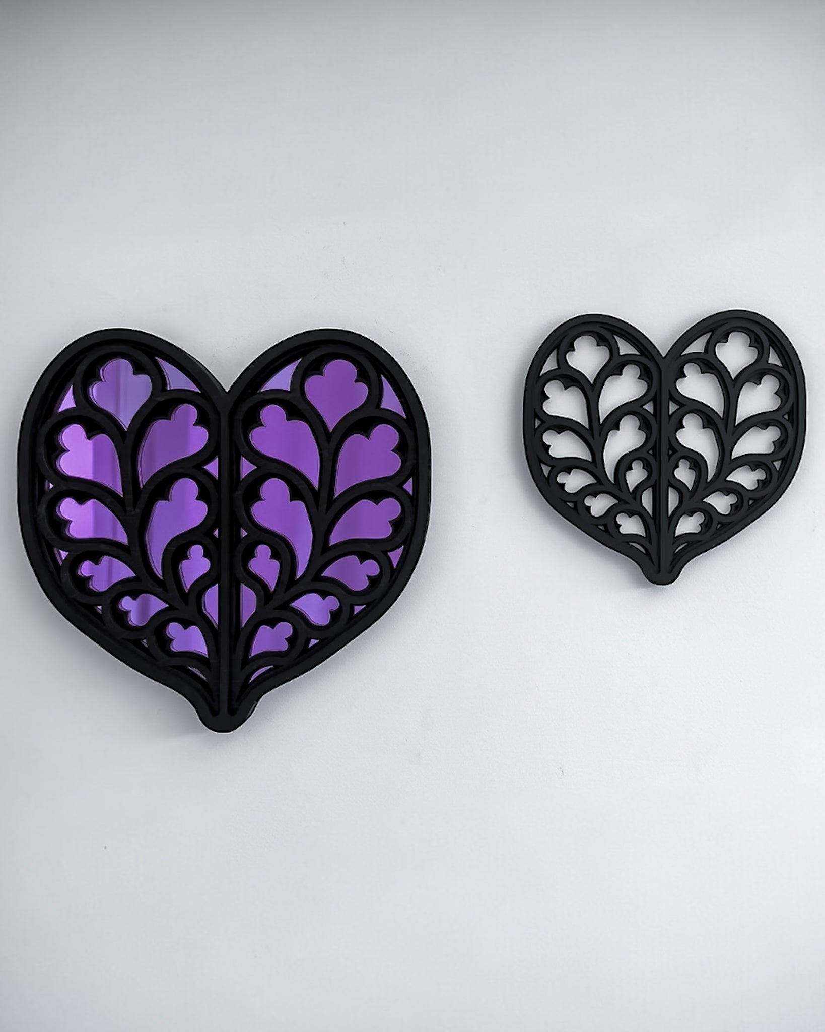 Heart of Yorkshire gothic cathedral mirror and tracery wall art in black and purple variants on white wall