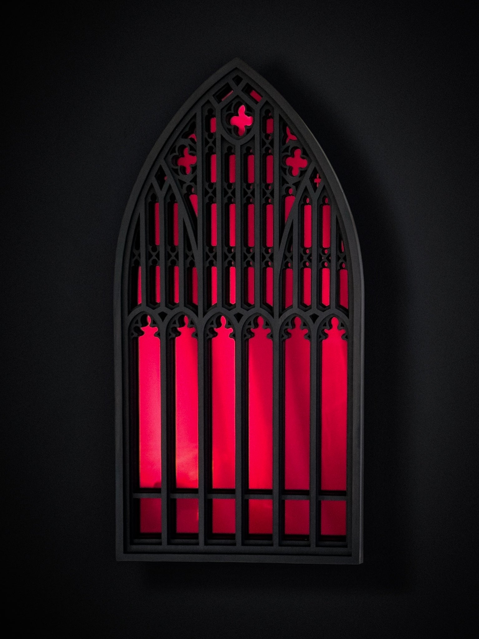 Salem Witch Museum window mirror in black layered wood with red acrylic mirror centre on a black background