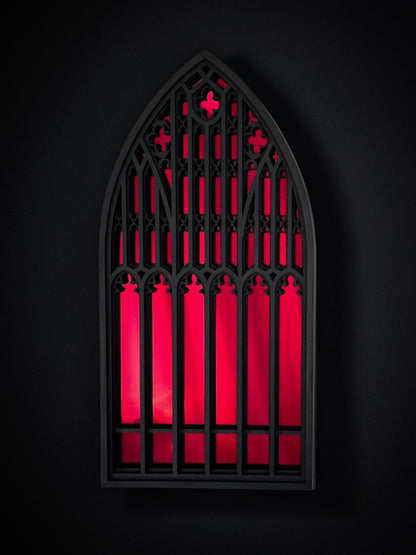 Salem Witch Museum window mirror in black layered wood with red acrylic mirror centre on a black background