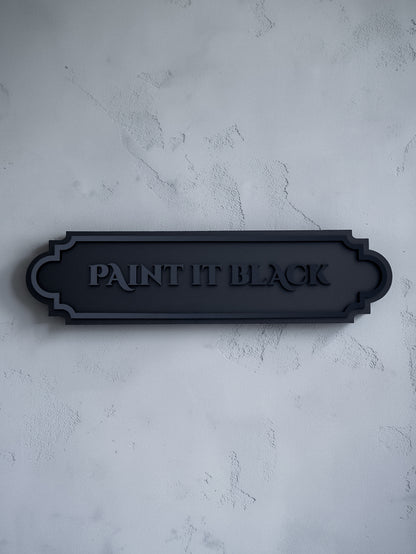 Paint it black gothic wall art plaque on textured grey wall