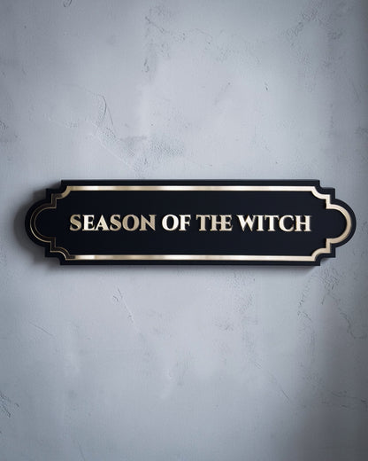 Black and Gold mirror Season of the witch gothic wall art plaque on textured grey wall