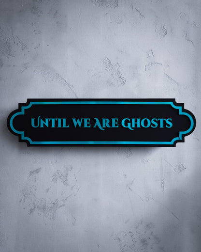 Until we are ghosts gothic wall art plaque in teal mirror on textured grey wall