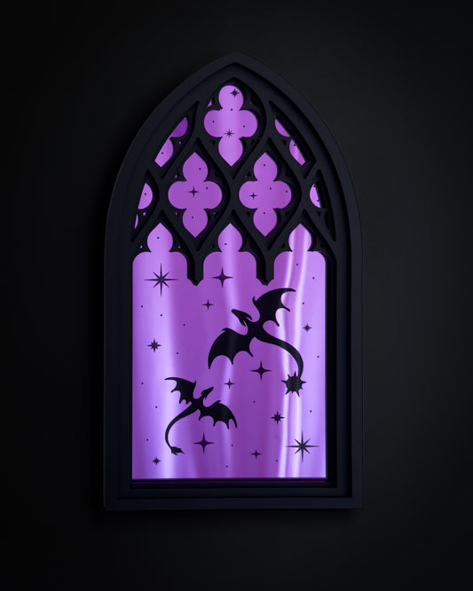 Gothic cathedral window mirror with purple acrylic panels and dragon silhouettes