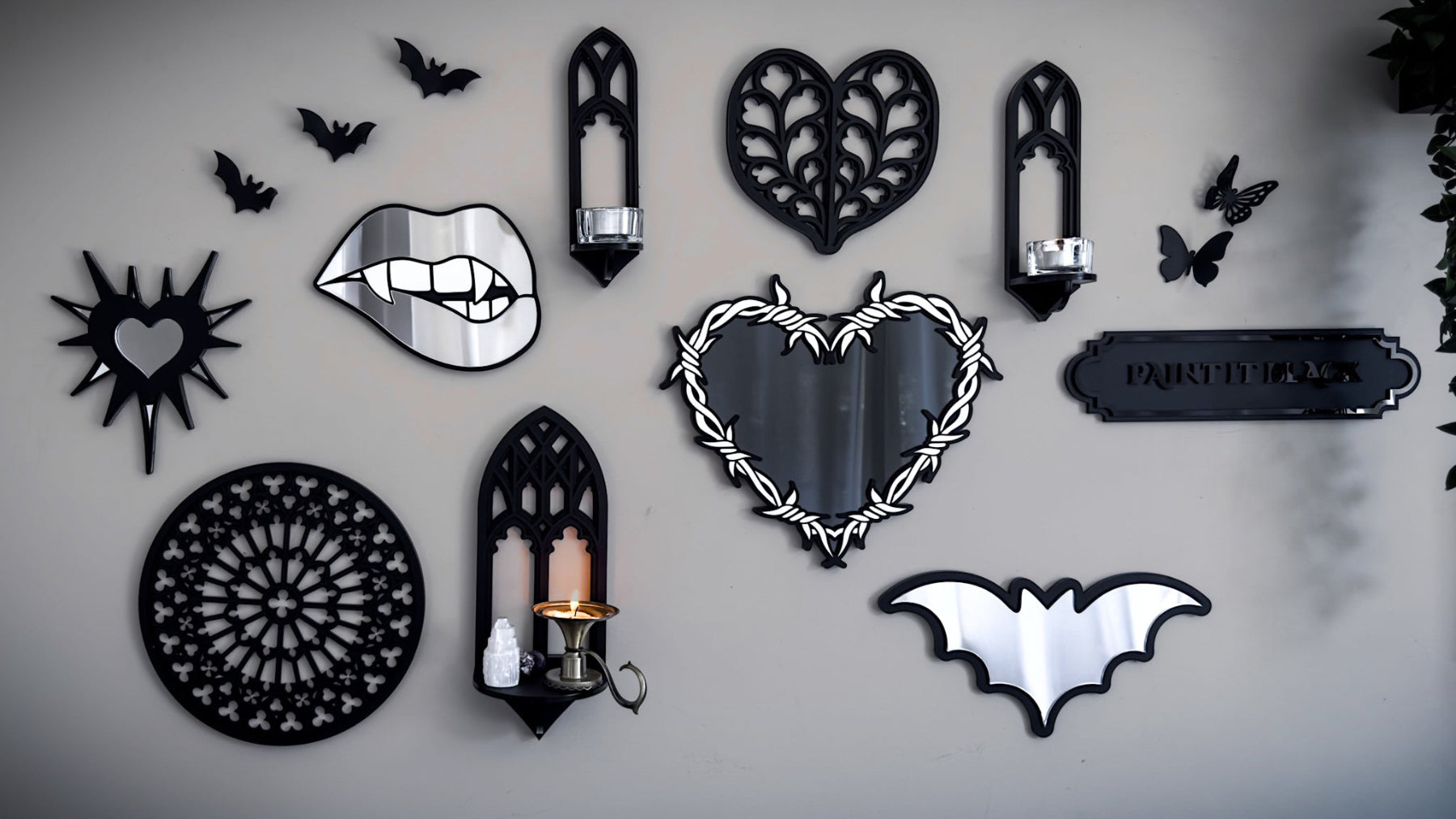 Gothic wall decor collection with handmade mirrors, cathedral shelves, bat wall art, and silver mirror lips