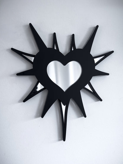 Gothic spiked barb heart mirror in black acrylic with silver mirrored centre, wall mounted