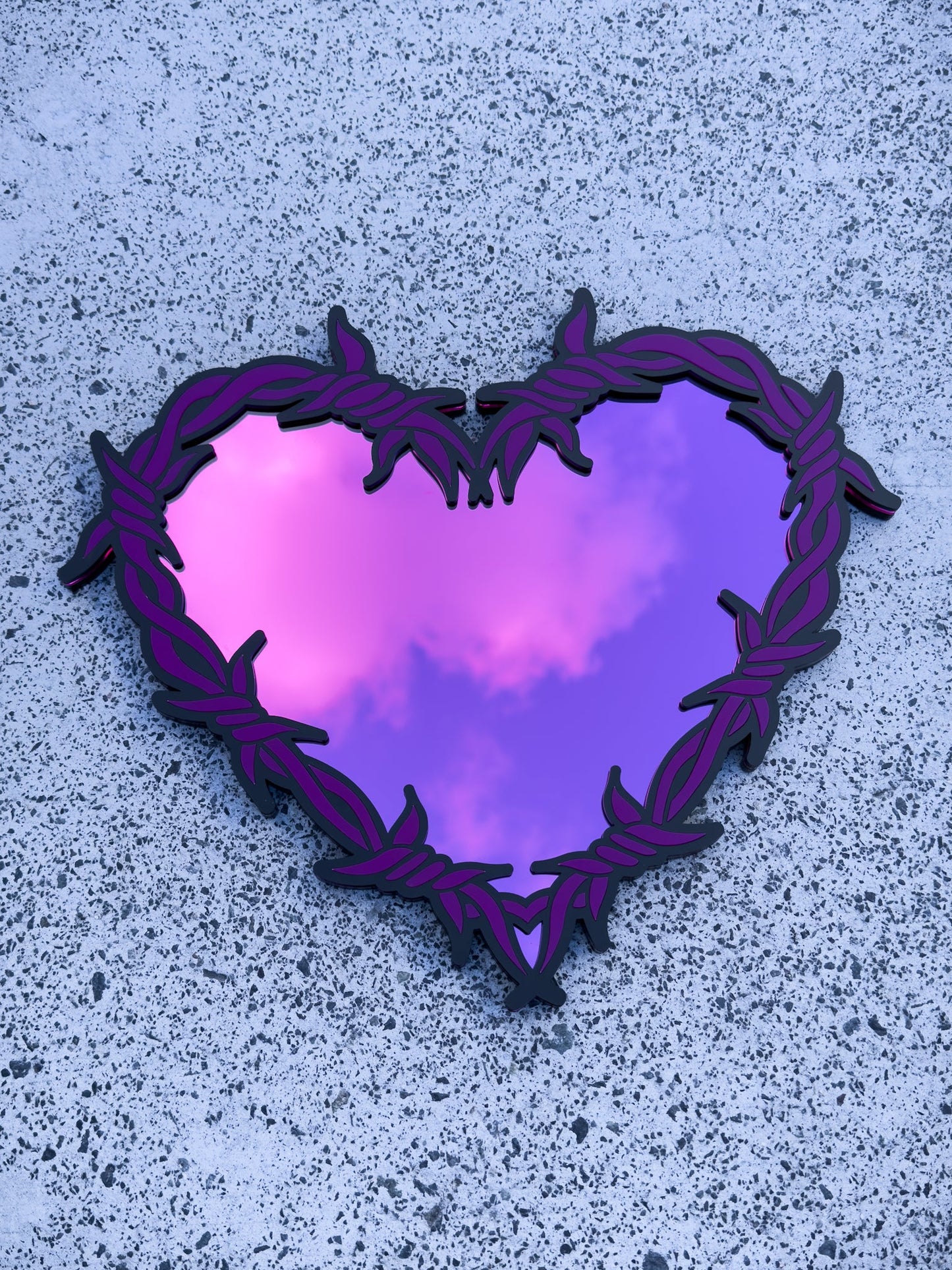 Purple and pink barbed wire heart mirror in layered acrylic gothic wall decor