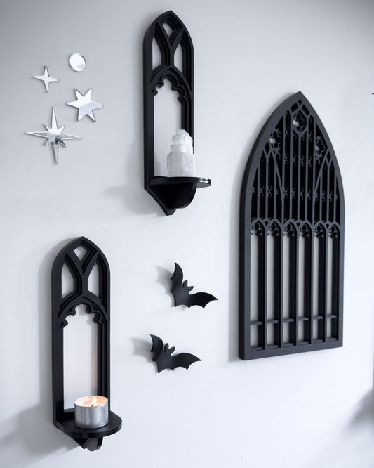 Close-up of Salem gothic tracery wall shelves and cathedral window wall art in black layered acrylic