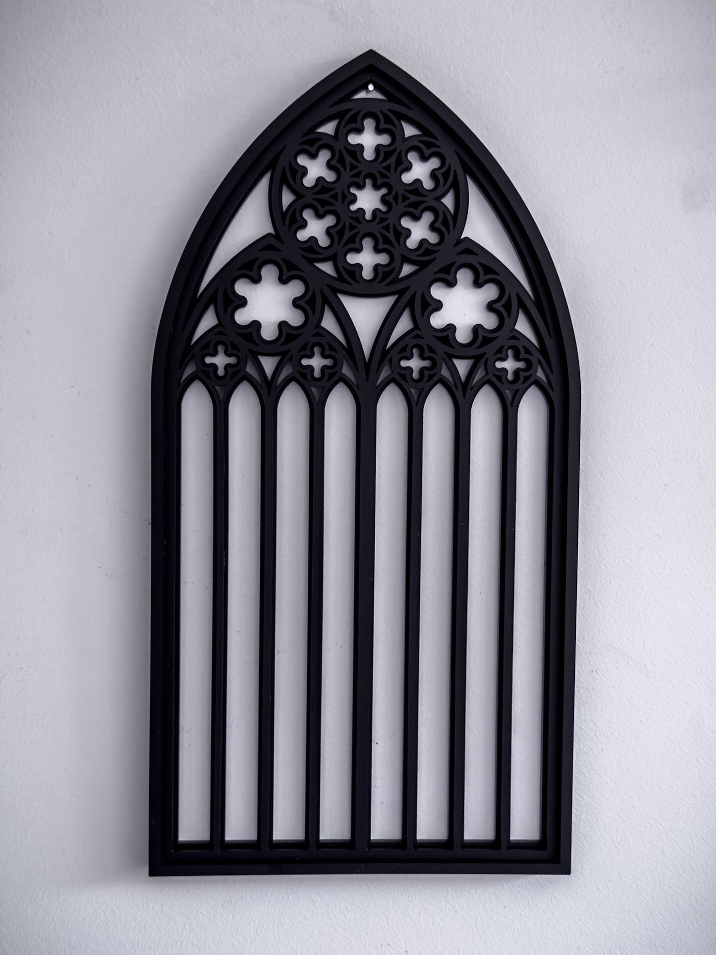 St Mary’s Cathedral tracery wall art in black layered acrylic shown on a white wall