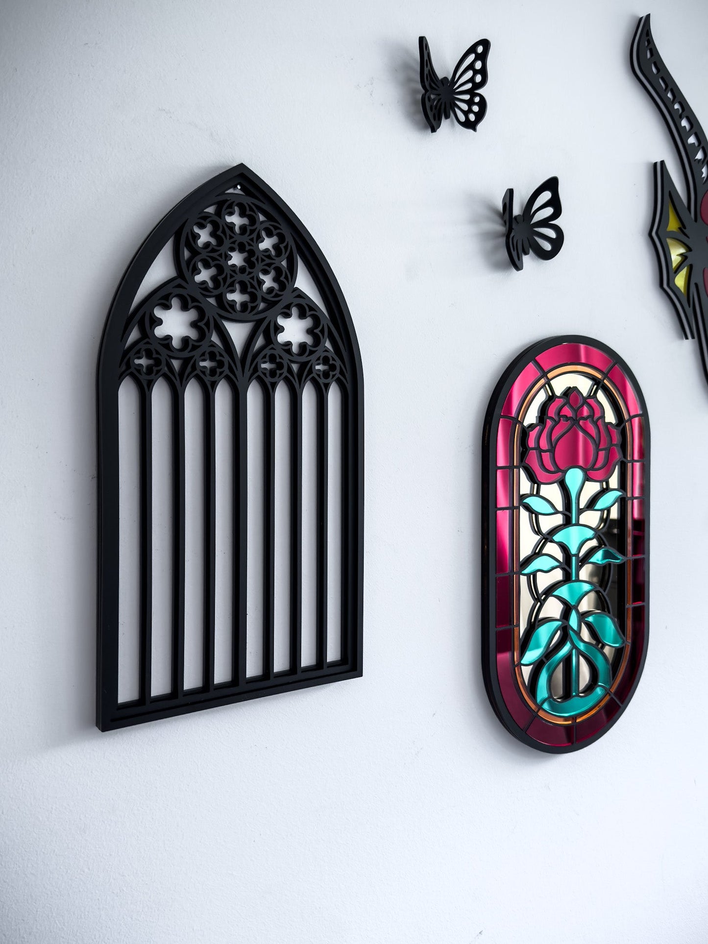 St Mary’s Cathedral tracery wall art in black layered acrylic shown with gothic stained glass style window wall art