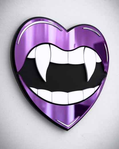 Side view of Gothic vampire lips mirror wall art in purple acrylic with fangs and black centre